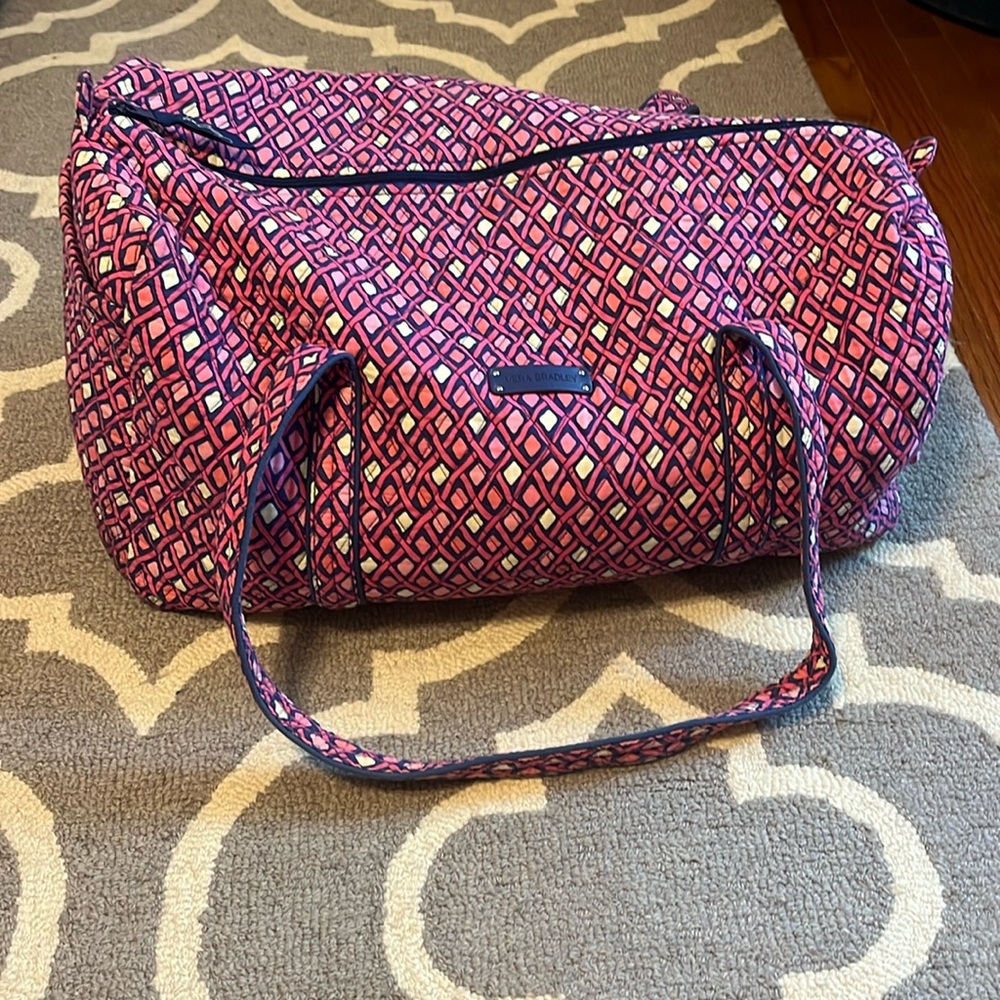 Pink and navy duffle bag